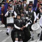 University of Otago physical education graduand Kaho Sakakura (27) pipes in the City of Dunedin...