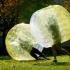 University of Otago students collide in a game of zorb football on the University Union lawn...