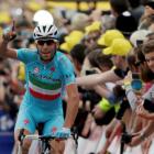 Vincenzo Nibali celebrates as he crosses the finish line to win the second stage of the Tour de...