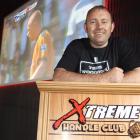 Xtreme Sports Bar's projector screen provides a backdrop to  Dwayne Quirk, of Queenstown,  who, ...