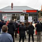 Locals gather outside the Westpac Bank in Ranfurly to protest its closure. PHOTO: PETER MCINTOSH
