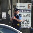 Much of the central city was evacuated and cordoned off for hours on June 16 as police assessed...