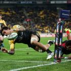 Vaea Fifita of the Hurricanes scores a try. Photo: Getty