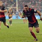  Bryn Hall of the Crusaders runs through to score a try. Photo: Getty