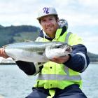 Blair Martinac holds a kingfish he caught yesterday at a Dunedin wharf set to be closed to...