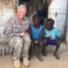 Lieutenant-colonel Lisa Kelliher talks to children during a visit to the Bor in eastern South...