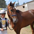 Four Starzzz Shiraz with Charlotte Purvis, holding the Crowmwell Cup the pair won. Photo: Jonny...
