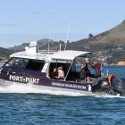 The first passenger ferry on Otago Harbour in more than 60 years takes company and Dunedin I-SITE...