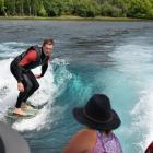 Surfing Lake Wanaka on a special wave created by his family’s Malibu jet-boat is Korban...