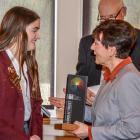 Lila Madden is congratulated for winning the 2019 Sir Paul Callaghan Eureka Premier Award by the...