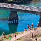 People crowd at Albert Town bridge despite the Covid-19 lockdown. Photo: QLDC