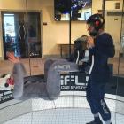 Lean back ... Erica Zanei practises her skills in the wind tunnel with iFly instructor Allen...