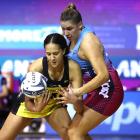 Pulse shooter Aliyah Dunn and Steel defender Te Huinga Reo Selby-Rickit battle for the ball...