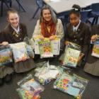 Lillie, (left), Mia, Sarah, of Battered Women’s Trust, Qiana and Narin with children’s activity...