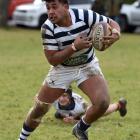 Otago Boys High School number 8 Semisi Taeiloa runs to score a try during the Otago Boys High...