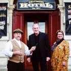 Oamaru Whitestone Civic Trust chairman Graeme Clark (centre) hands the keys to the Criterion...