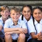 Kavanagh College’s record four sets of year 7 twins (from left) Konrad and Levi Maaka, Noah and...