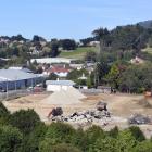 Diggers clear the site for a new warehouse for Hilton Haulage at Sawyers Bay yesterday. PHOTO:...