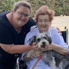  Kim Kennedy and her late mother Patricia Robinson, holding her dog Furby earlier this year....