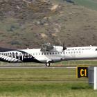 Air New Zealand flight NZ5493 from Christchurch lands at Dunedin Airport just after 12pm...