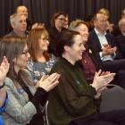 People applaud as Otago Community Trust chairman Diccon Smith addresses the annual meeting...