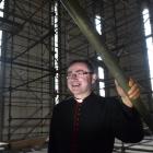 The Dean of St Paul’s Cathedral, the Very Rev Dr Tony Curtis stands among scaffolding in the...