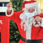 Santa will be making an appearance at the Meridian mall this year, complete with face mask. PHOTO...