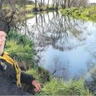 A waiting game . . . Neil Shanks of Rangiora, waits for luck to run his way near the three rivers...
