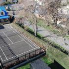 The home of Dunedin KC Anne Stevens boasts a tennis court out the back. During its construction,...