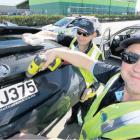 Fun job . . . Rangiora Community Patrol leader Chris Baker (right) and patrol volunteer Jimmy...