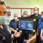 Radiation Therapist Andre Aumata shows off the Dunedin Hospital's new bladder scanner alongside ...