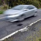 A pothole in Highcliff Rd yesterday morning. Photo: Gregor Richardson