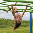 Kora Dean (8), of Balclutha, tries out some of Centennial Park’s new play equipment ahead of...