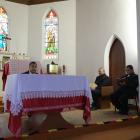 Addressing the congregation at a Free Church of Tonga service held at Sacred Heart Church in...