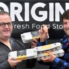 Origin Fresh Food Store general manager Sam Hutchison (left) and Old Road Honey and Eggs owner...