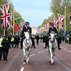 Mounted police officers can be seen on the Mall ahead of the Coronation of King Charles III and...