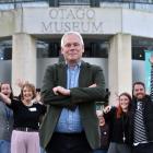 Otago Museum director Dr Ian Griffin and staff members yesterday celebrate new Dunedin City...