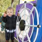 Charlie Turner (1½) skippers the Betsy Douglas, the steamboat that forms the new playground in...