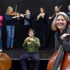 Cellist Kate Stephens of the Dunedin Symphony Orchestra with (clockwise from centre) Ioan Fuller,...