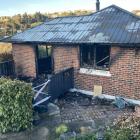 A fire badly damaged Lookout Point house yesterday morning. PHOTO: STEPHEN JAQUIERY