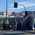 Emergency services at the scene of the crash this afternoon. Photo: Craig Baxter