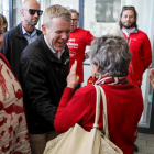 Chris Hipkins with Christchurch MP Megan Woods (left) greeting a supporter during a walkabout in...