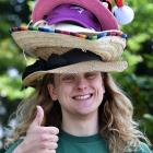 Daniel Lyth, 23, has been wearing a different hat a day for seven years, and wore several more...