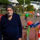 Beal St resident John Sim stands beside the festive redesign his neighbours gave the long-term...