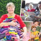 Left: Palmerston artist and author Alicia Hall holds together the huge pile of knitting she has...