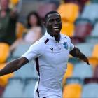 West Indies quick Shamar Joseph celebrates his side’s victory in the second test against...