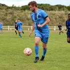 Connor Neil holds the ball for the Dunedin City Royals in their preseason game against Selwyn at...