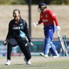 Susie Bates celebrates taking a wicket in the last over of the third T20 International between...