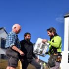 Leigh Pickford (left) and Stewart Construction managing director David Grant (centre) meet site...