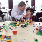 Lennon, 4, and Courtney McNeill, of Dunedin, place Lego on a map of South Dunedin at the South...